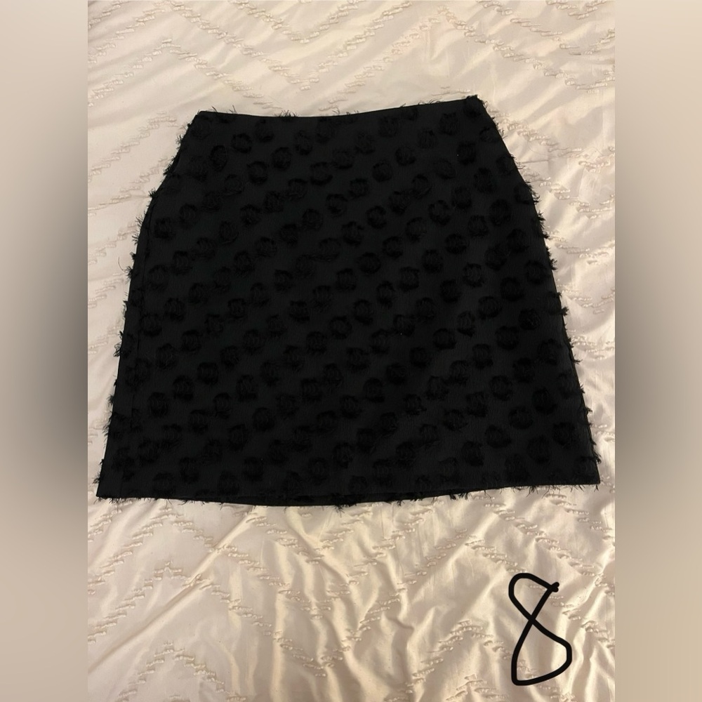 Two short skirts and a maxi skirt
